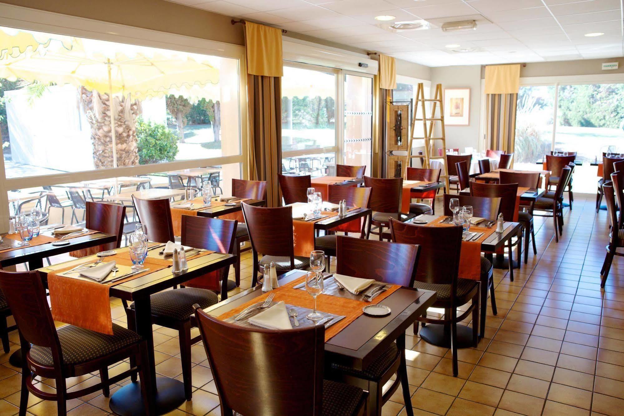 Brit Hotel Marseille Aeroport Mirabeau Restaurant foto